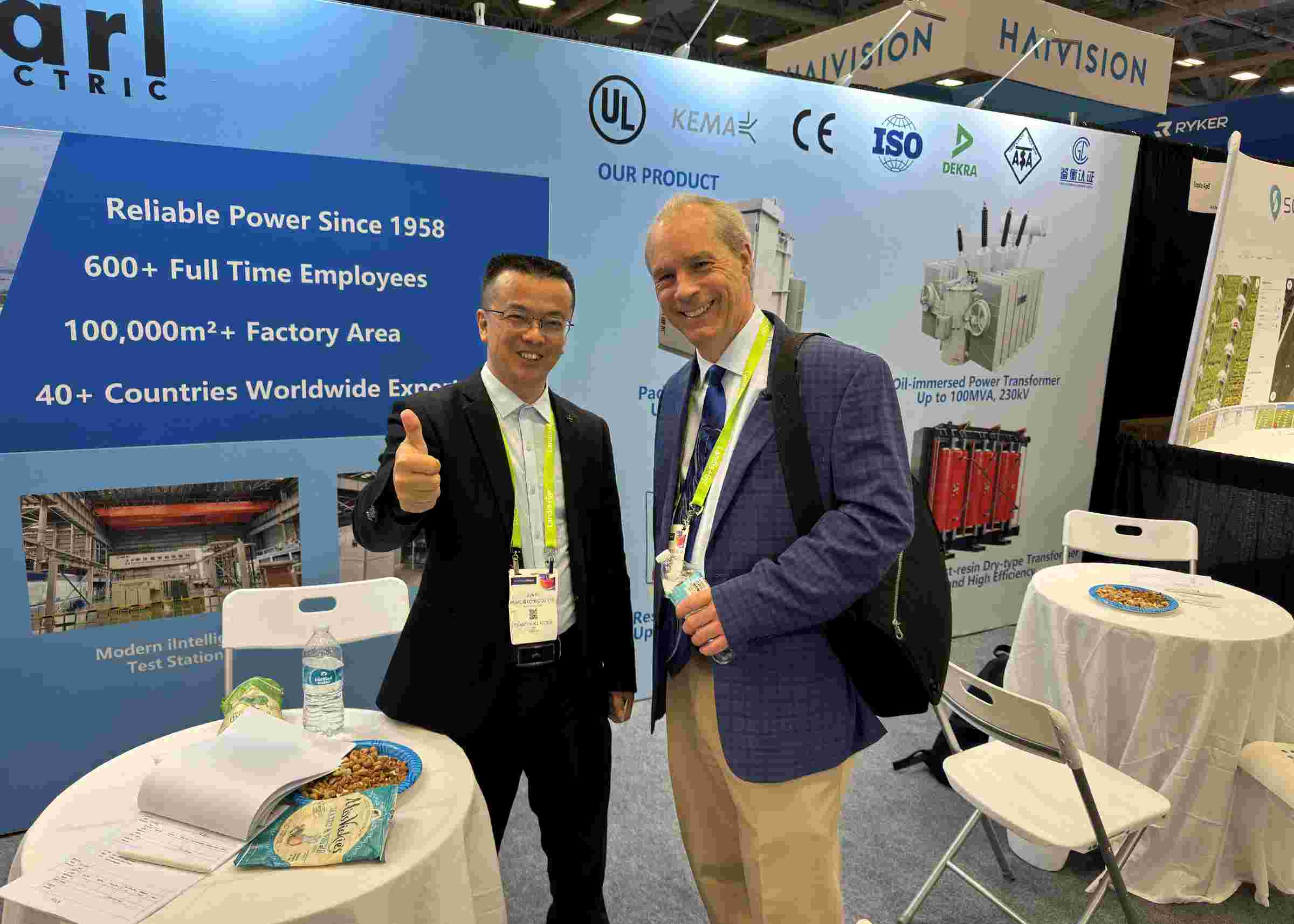 Transformer sales engineer posing for a photo with a U.S. client