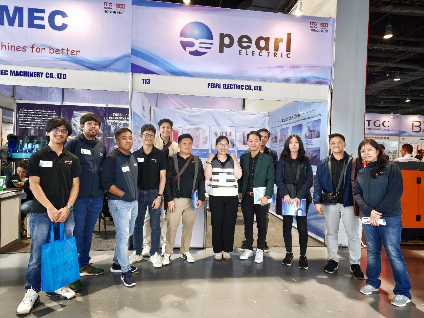 Pearl Electric Transformer sales engineer posing for a photo with a client